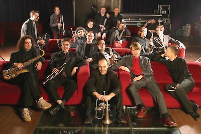 Announcement image for the event John Hollenbeck & Jazz Big Band Graz